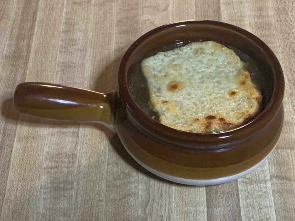 French Onion Soup in a bowl with Cheesy Toast